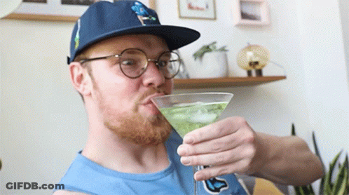 Man Drinking Green Martini GIF