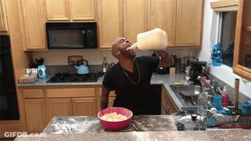 Man Drinking Milk From Gallon Bottle GIF