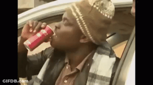 Man Drinking Soda In Back Seat Of Car GIF