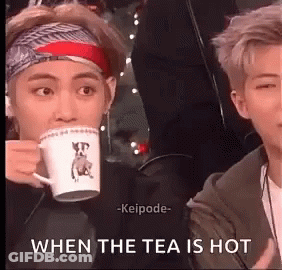 Man Drinking Tea While Another Watches GIF