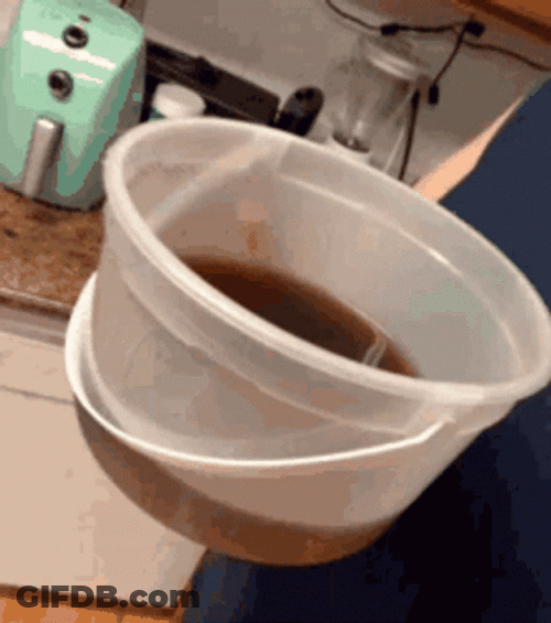Man Drinking The Tea In Bucket GIF