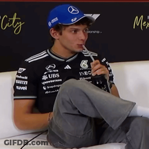 Man Drinking Through Straw In Mercedes Hat GIF
