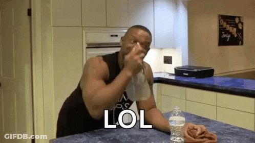 Man Drinking Water At Counter Says LOL GIF
