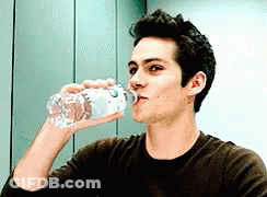 Man Drinking Water From Bottle With Letter O GIF