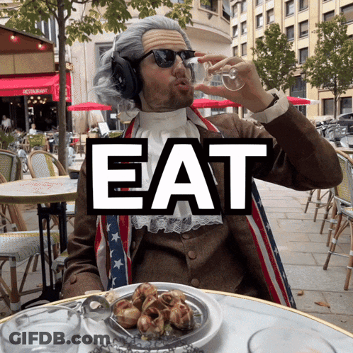 Man Drinking Wine In Front Of Eat Sign GIF