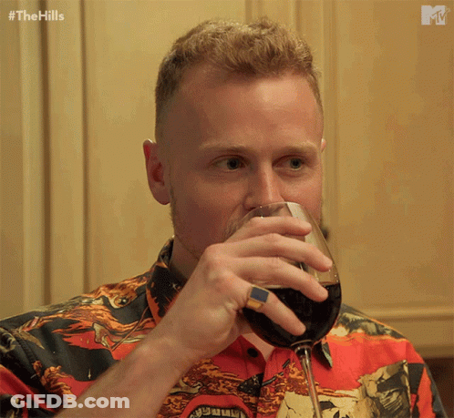 Man Drinking Wine GIF