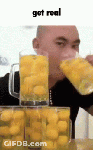 Man Drinking Yellow Balls Saying Get Real GIF