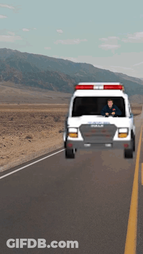 Man Driving Ambulance On Desert Road GIF