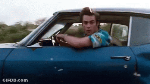 Man Driving Blue Car GIF