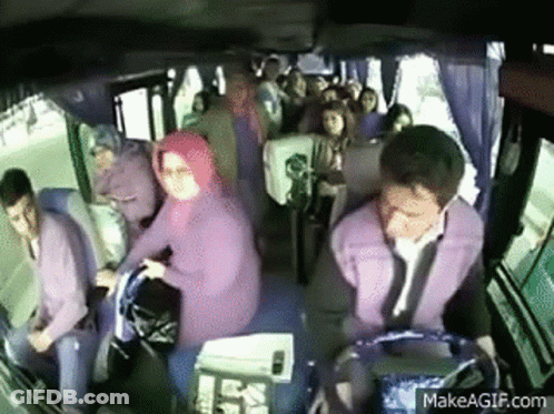 Man Driving Bus With People GIF