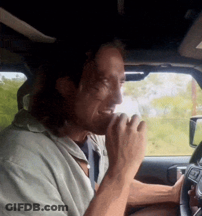 Man Driving Car And Eating GIF