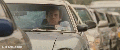 Man Driving Car In Traffic Jam GIF