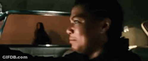 Man Driving Car Looking Out Window GIF