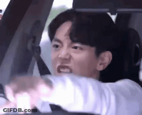 Man Driving Car Making Face GIF