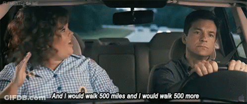 Man Driving Car Next To Woman GIF