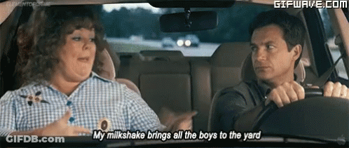 Man Driving Car Talking To Woman In Back Seat GIF