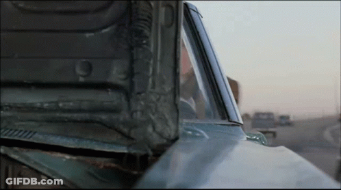 Man Driving Car With Broken Hood GIF