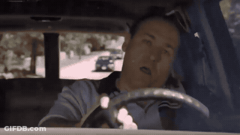 Man Driving Car With Eyes Closed GIF