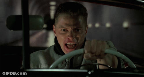 Man Driving Car With Mouth Open GIF