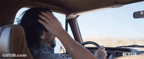 Man Driving Car With Netflix Logo GIF