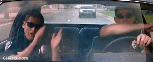 Man Driving Car With Two Police Officers GIF