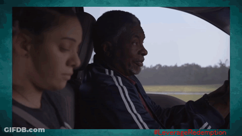 Man Driving Car With Woman In Back GIF