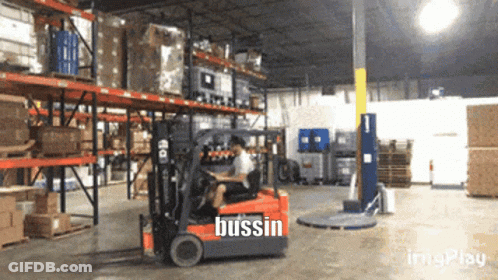 Man Driving Forklift With Bussin On Side GIF