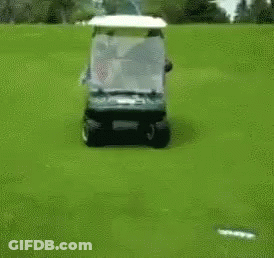 Man Driving Golf Cart With Woman On Back GIF