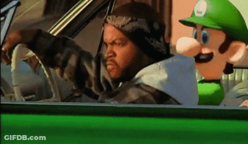 Man Driving Green Car With Mario Mascot GIF