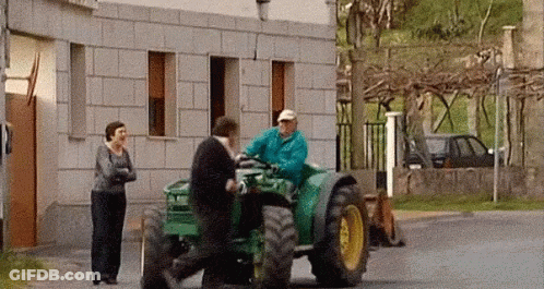 Man Driving Green John Deere Tractor GIF
