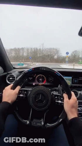 Man Driving Mercedes On Highway GIF