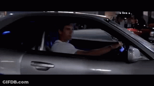 Man Driving Silver Sports Car With Blue Seat Belt GIF