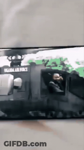 Man Driving Vehicle Saying Uganda Air Force GIF