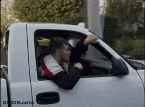 Man Driving White Truck With Hand Out Window GIF