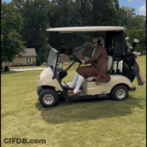 Man Driving Yamaha Golf Cart GIF
