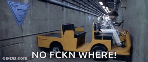 Man Driving Yellow Vehicle In Tunnel GIF