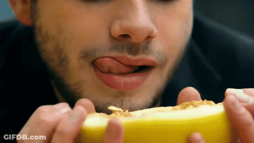 Man Eating Banana Sideways GIF