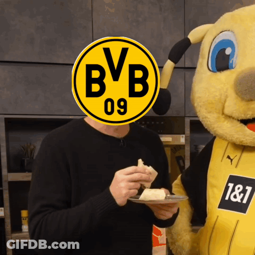 Man Eating Cake With BVB 09 Logo On Head GIF