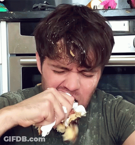 Man Eating Cake With Icing On Face GIF