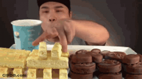 Man Eating Cakes And Cookies GIF