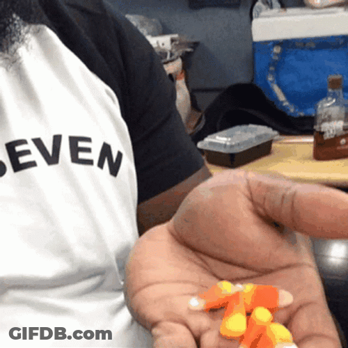 Man Eating Candy Corn GIF