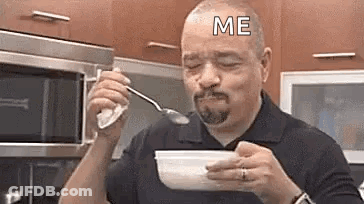 Man Eating Cereal From Bowl With Spoon GIF