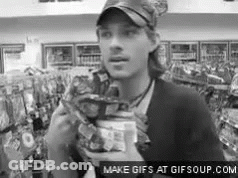 Man Eating Chips In Store GIF
