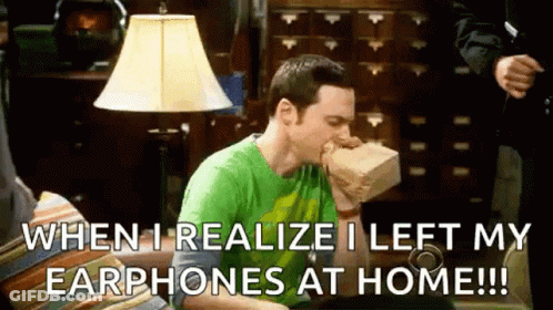 Man Eating Food Bag On Couch With Headphones GIF