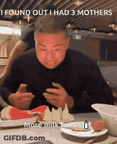 Man Eating Food Looking At Phone Saying I Found Out I Had 3 Mothers GIF