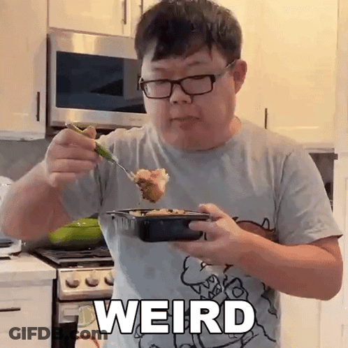 Man Eating Food Saying Weird GIF