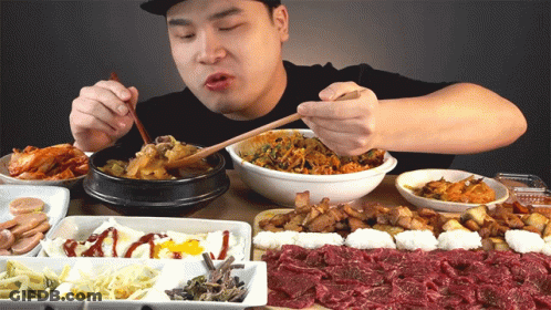 Man Eating Food With Chopsticks GIF