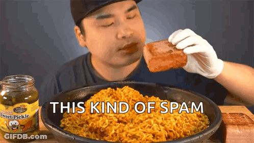 Man Eating Ham Next To Jar Of Pickle GIF