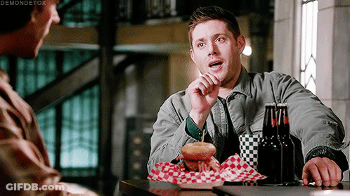 Man Eating Hamburger And Drinking Beer GIF