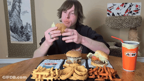 Man Eating Hamburger And Fries At A&W GIF